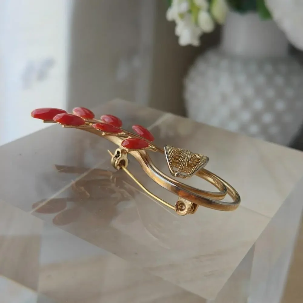 Vintage dark coral and gold tone floral spiral brooch
